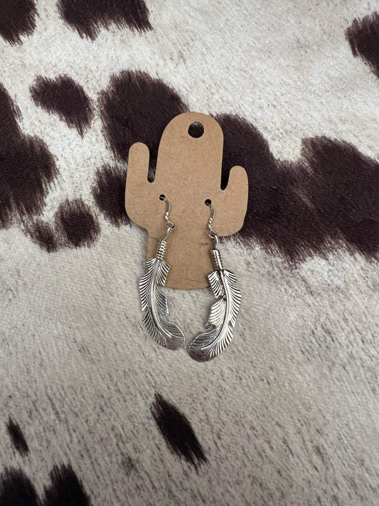 New silver feather dangle earrings