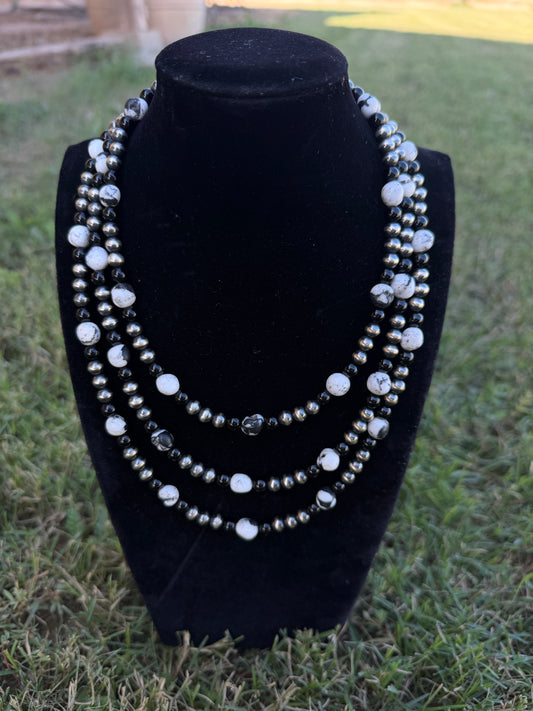 New white buffalo and black onyx and 6mm silver pearls