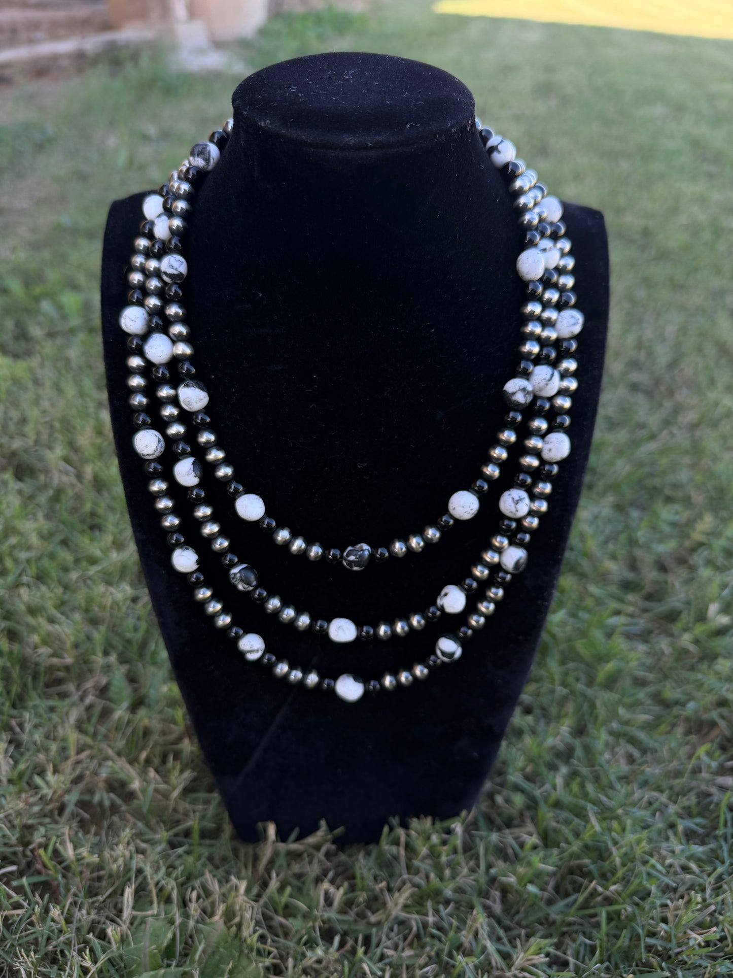 New white buffalo and black onyx and 6mm silver pearls