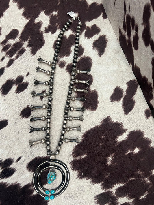 Vintage turquoise and silver bench made squash blossom